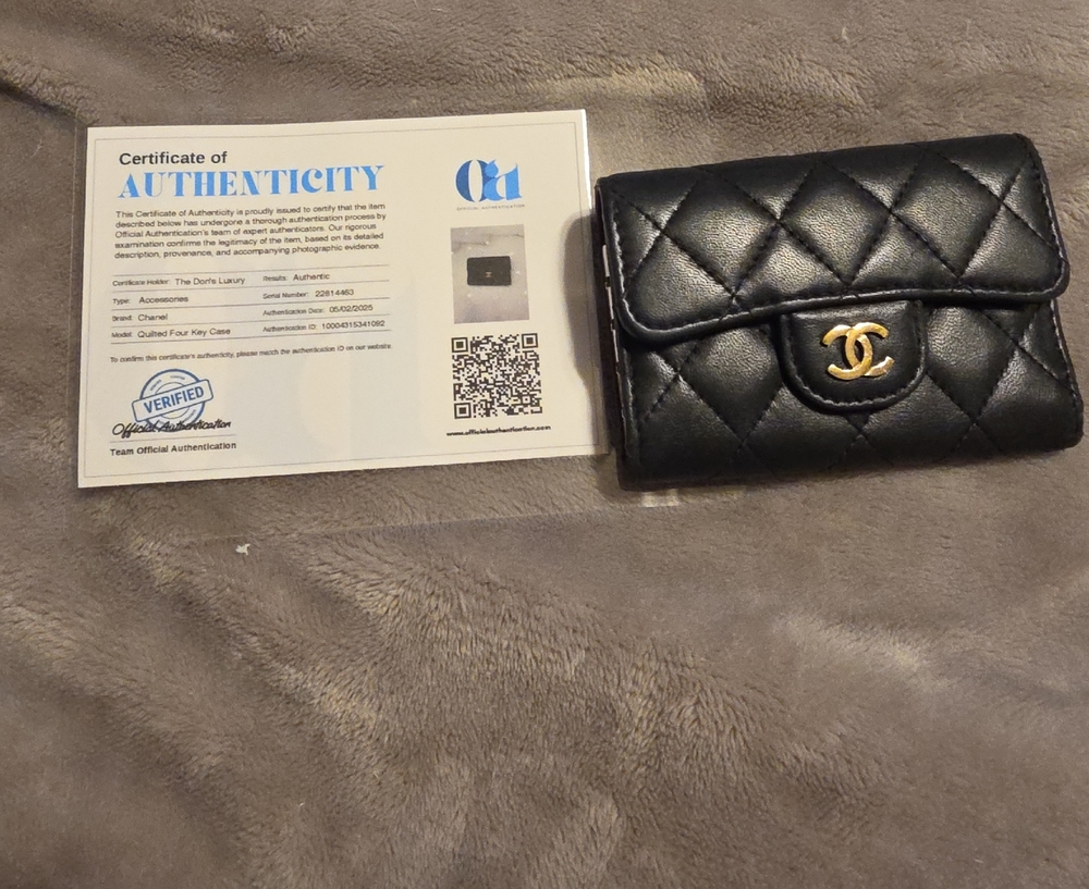 CHANEL Black Quilted Card Holder with Gold Logo